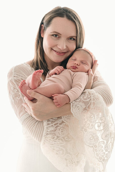 Mum with her baby girl cuddling 